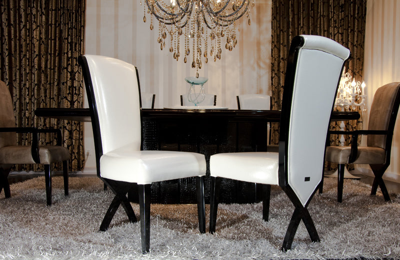 Homeroots Two 43.5" White Leatherette and Black Wood Dining Chairs with X Shaped Rear Legs 284102